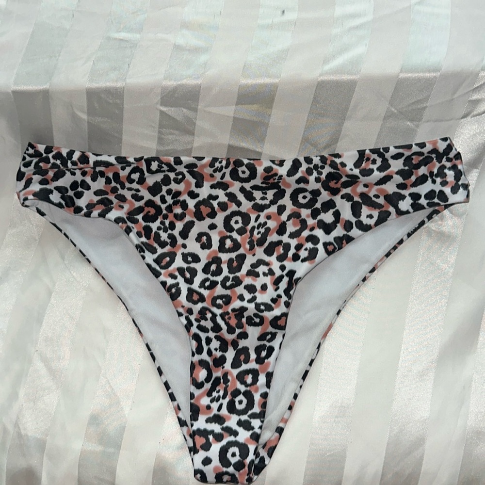 Animal print bikini bottoms. Size small but fit big enough to be medium.